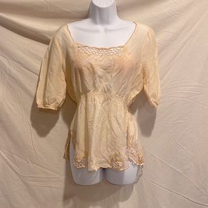 Adorable shirt with beautiful embroidery and scallop bottom